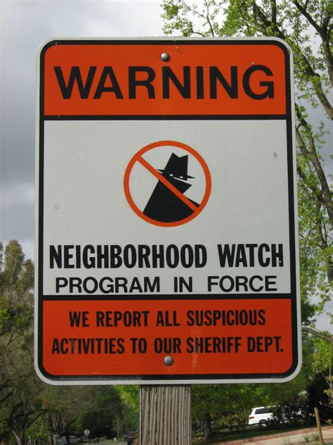 Neighbors discussing a neighborhood watch program