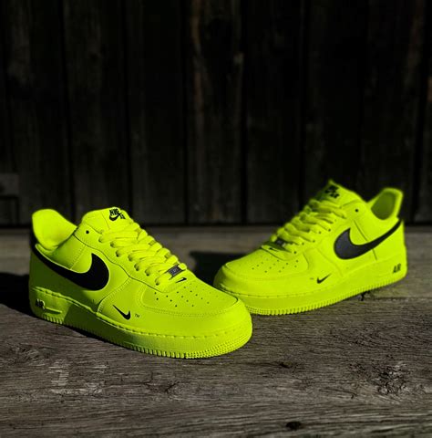 Neon Air Force 1s with bold accents