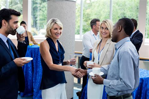 Group of people networking at a conference