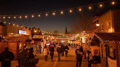 A bustling Christmas market in Niagara Falls, featuring local vendors and artisans