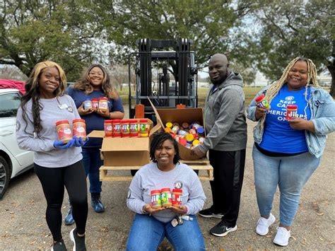 North Louisiana Food Bank volunteers and community members at a food drive event