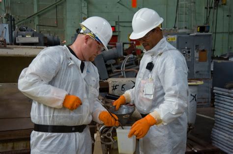 Nuclear engineer collaborating with a team