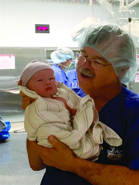 OB-GYN doctor delivering baby