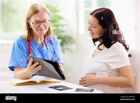 OB-GYN doctor examining patient