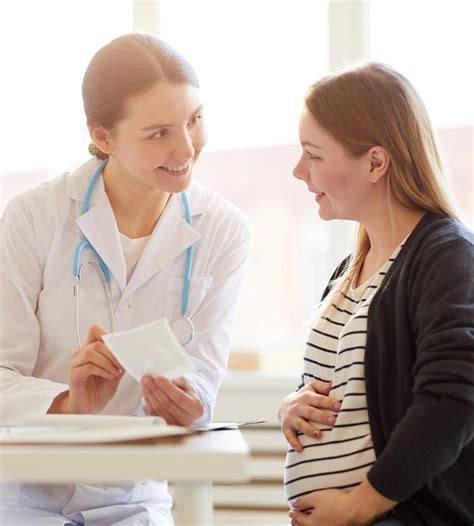 OB-GYN doctor using medical equipment