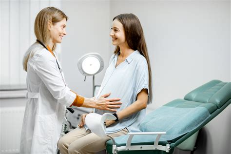 OB-GYN doctor working with nurses