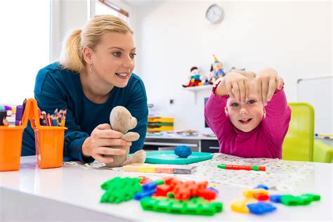 Air Force occupational therapist working with a patient during a session