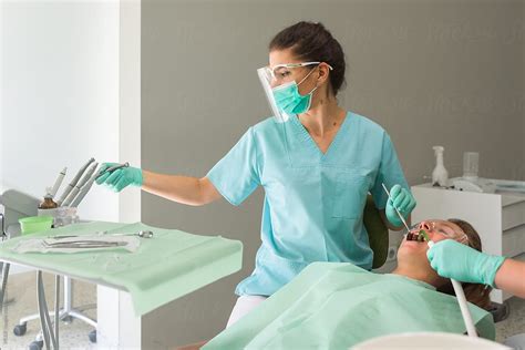 Orthodontist Working with a Patient