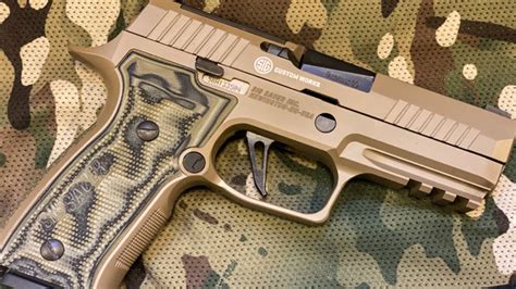 Sig P320 with accessories