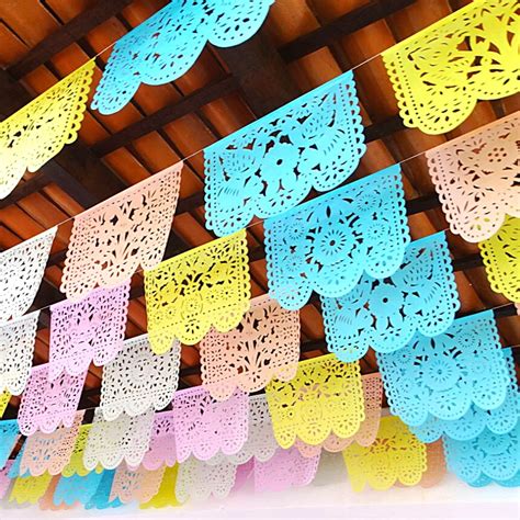 Papel picado decorating a party