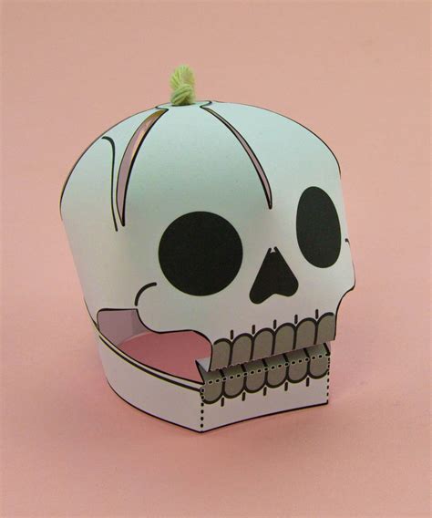 Tips and tricks for creating a flawless 3D paper skull, including advice on paper choice and assembly.