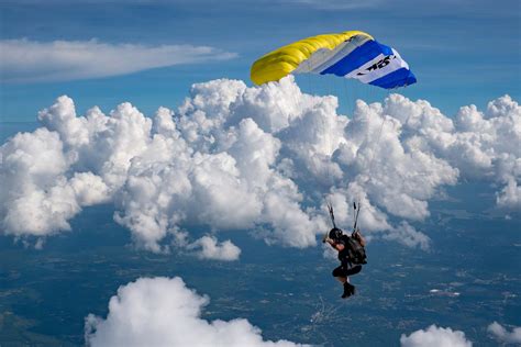 Combat Controller parachuting into a mission zone