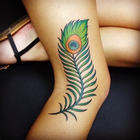 Peacock feather tattoo on the back