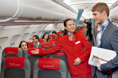 Personal flight attendant serving champagne on a private jet