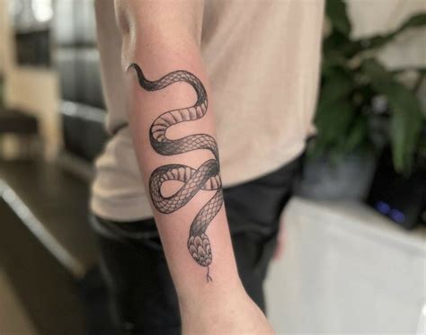 Personal symbolism in snake tattoos