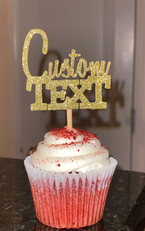 Personalized cupcake topper on a cupcake