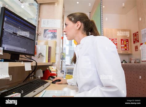 Pharmacy Technician Using Computer