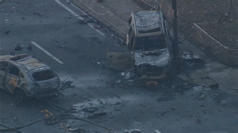 The aftermath of a plane crash, with debris and wreckage scattered everywhere.