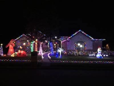 A commercial building in Plano decorated with Christmas lights