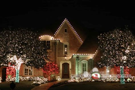 A residential street in Plano decorated with Christmas lights