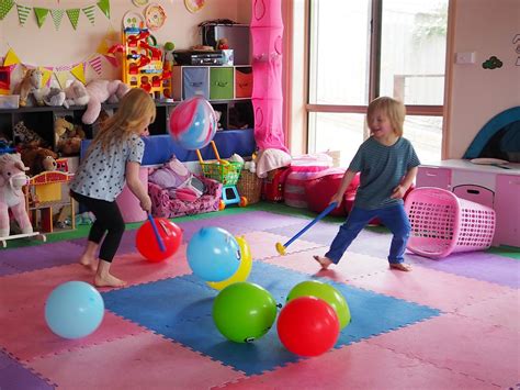 A photograph of a person engaging in a playful activity