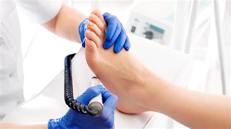 A podiatrist examining a patient's foot