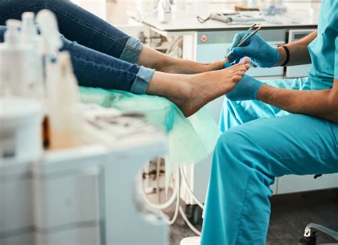 A podiatrist working with a team