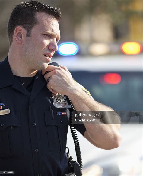 Police officer using a radio