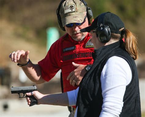 Police Officer Demonstrating Pistol Safety