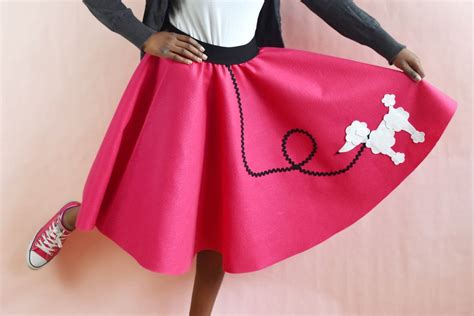 A classic poodle skirt design featuring a cute cartoon poodle and colorful polka dots