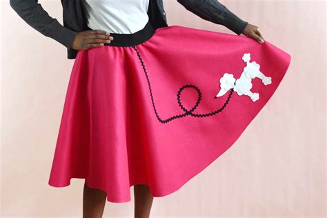 A close-up view of the pattern pieces for a poodle skirt, including the circular skirt, waistband, and appliqué