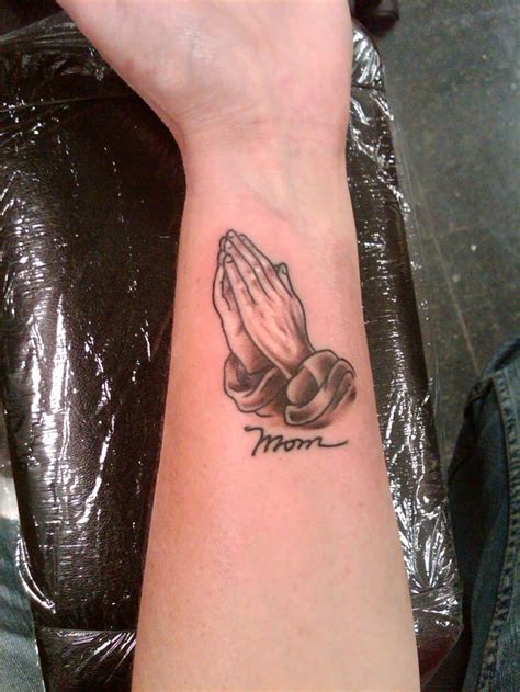 Praying hands tattoo designs for men