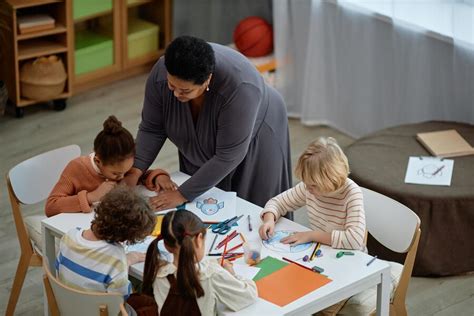 preschool teachers engaging with students