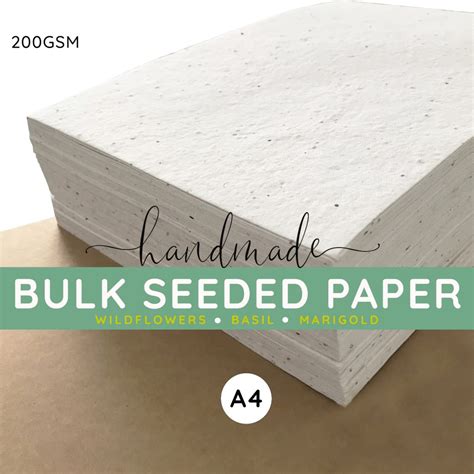 A person holding a printable seed paper sheet