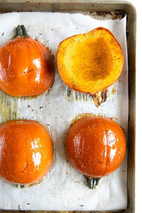 A person baking a pumpkin pie