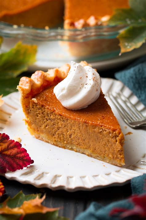 A pumpkin pie with whipped cream