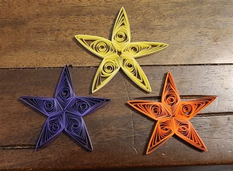 A single quilled star made from green paper