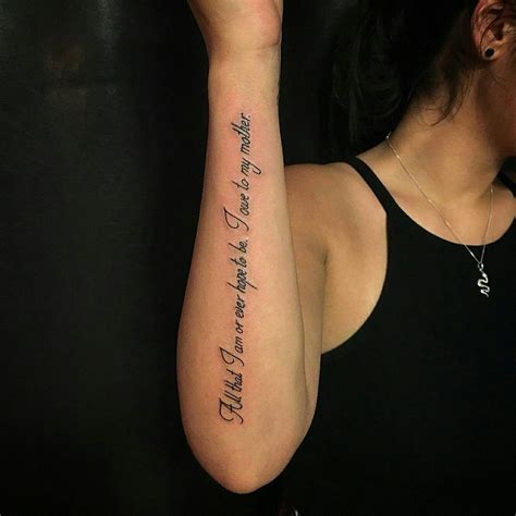 Quote back forearm tattoo