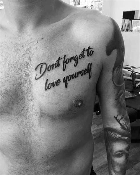 Quote chest tattoo