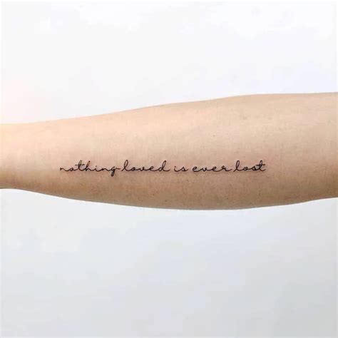 Quote tattoo on the ribcage