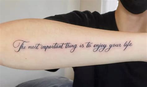 Quote bicep tattoos