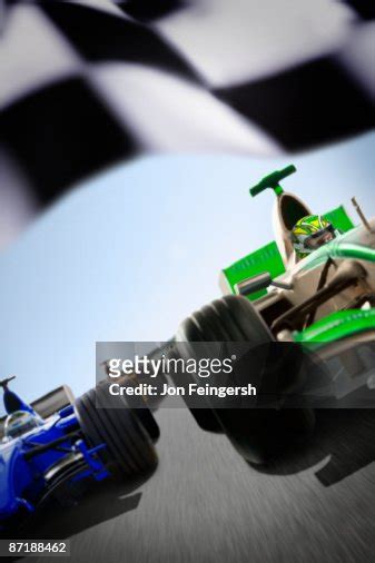 A race car approaching the checkered flag