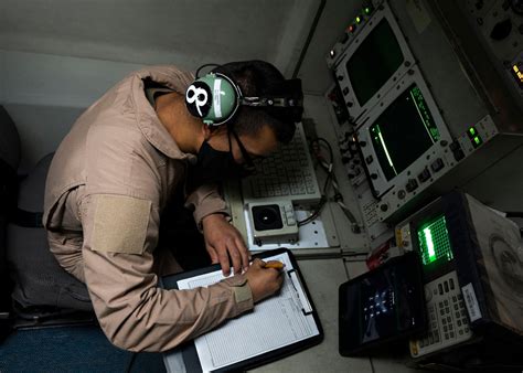 Radar technician working with radar systems