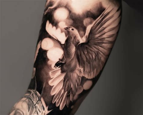 Description of Realistic Dove Tattoo 9