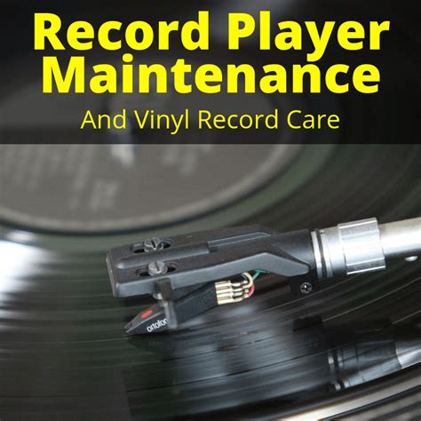 A person maintaining a record player with a cleaning brush