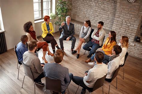 A support group meeting, with individuals sharing their experiences and struggles