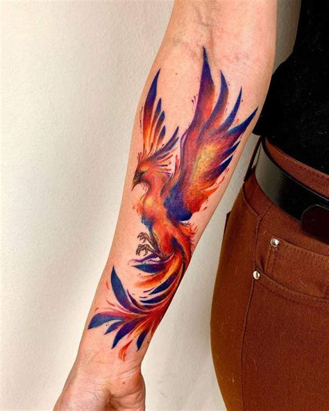 Red phoenix forearm tattoo