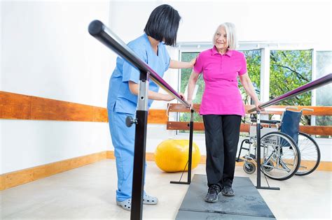 Air Force occupational therapist working with a patient during rehabilitation