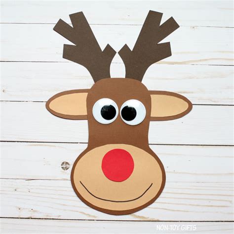 A 3D reindeer template printable craft with antlers and a red nose