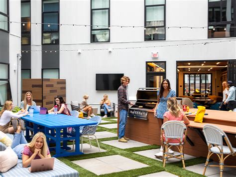 Residents enjoying the beautifully landscaped courtyard